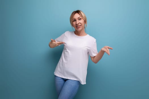 slim young woman dressed in a white tank top with a business mockup.