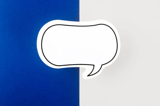 Speech bubble with copy space communication talking speaking concepts on blue and white background.