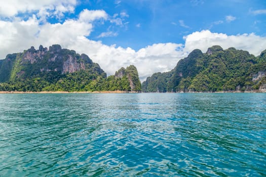 Three rocks in Cheow Lan Lake, Khao Sok National Park, Thailand.