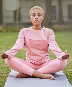 Meditation, yoga and woman training in a park for calm, peace and relax for her mind. Young girl with zen energy during spiritual exercise for wellness, health and motivation with faith in a garden.