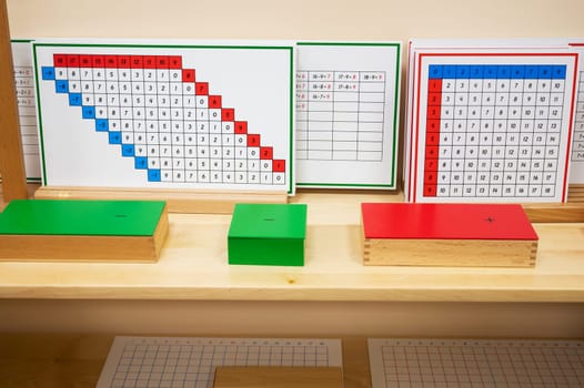 Classroom of Montessori kindergarten. The colorful Montessori material. Concept of children learning toy