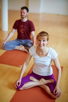 Yoga for whole body health. two people doing yoga together indoors