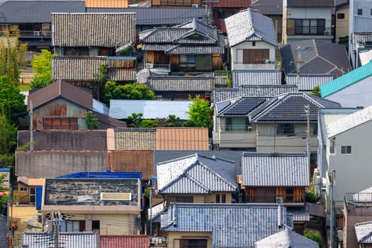 Looking down on roofs of old houses in small town Japan. High quality photo