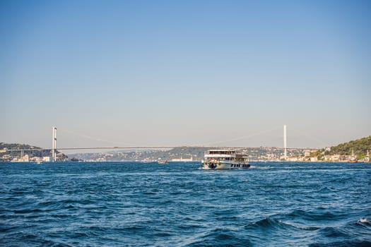 Muslim architecture and water transport in Turkey - Beautiful View touristic landmarks from sea voyage on Bosphorus.
