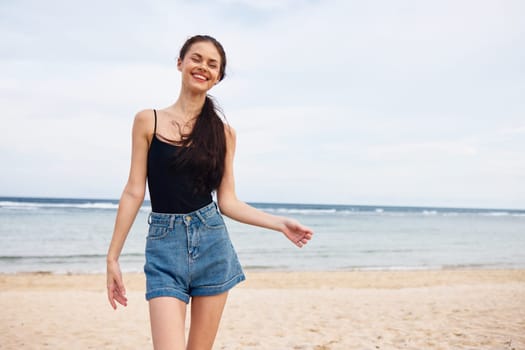 beauty woman summer young lifestyle freedom smile tan water smiling travel sunset sea beach person running positive carefree sun leisure female