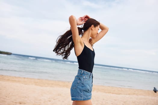 wave woman beauty travel walking leisure smile summer sunrise young beautiful lifestyle water shore sunset sea person positive happiness beach running