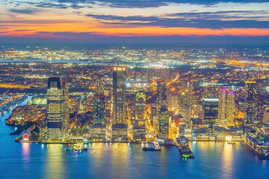 Cityscape of Jersey City skyline  from Manhattan New York City at sunset  