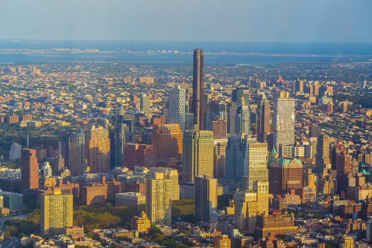 Cityscape of downtown Brooklyn skyline  from Manhattan New York City at sunset  