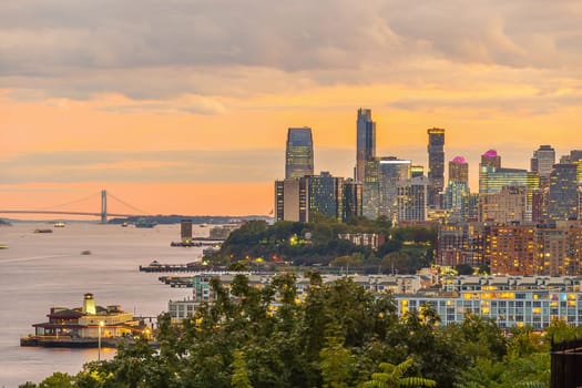 Cityscape of Jersey City skyline  from Manhattan New York City at sunset  