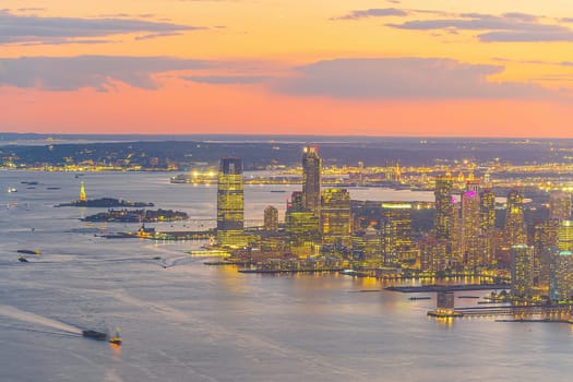 Cityscape of Jersey City skyline  from Manhattan New York City at sunset  