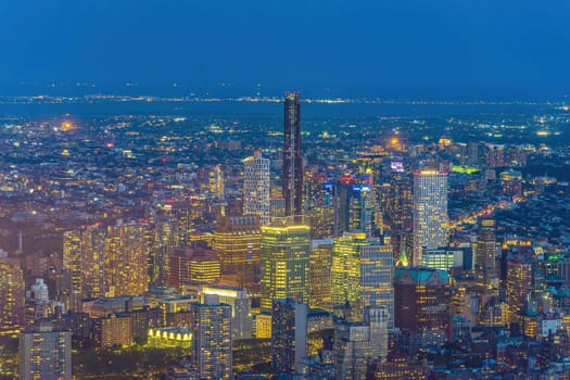 Cityscape of downtown Brooklyn skyline  from Manhattan New York City at sunset  