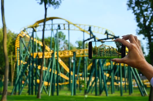 Woman photographing the attractions from your phone