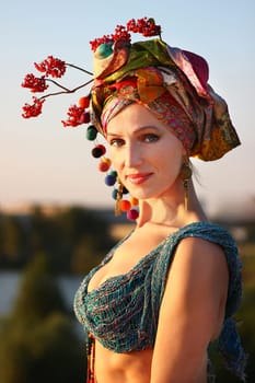 Beautiful young woman in ethnic clothes outdoor