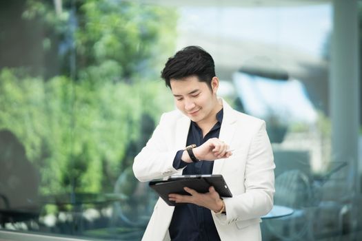 businessman working with tablet in the cafe, business concept