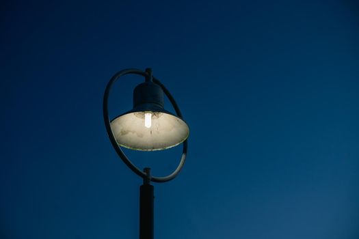 close up of street light and blue sky background