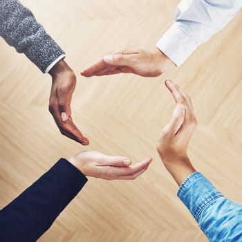 Teamwork, recycling or hands of business people in circle for motivation, support or sustainability in office. Diversity, recycle or above of employees for goals, community help or partnership group.