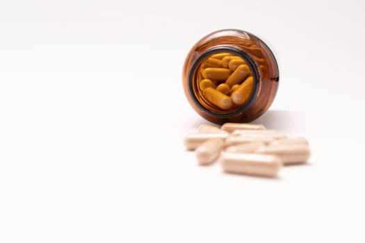 Softgel Capsules OF Slippery Elm, Brown Glass Bottle On White Background, Copy Space for Text. Herbal Supplement, Medication. Ulmus Fulva, Natural Remedy Concept. Horizontal plane.