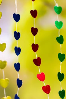 Colored shiny hearts hanging garland for Valentine's Day