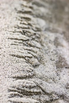 Cracked dry ground sand on the nature outdoors. Texture, background, sample