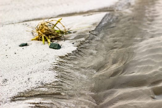 Cracked dry ground sand on the nature outdoors. Texture, background, sample