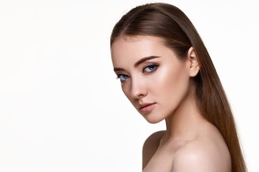 profile of beautiful young woman with perfect skin on white background. copy space