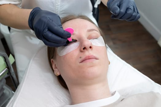 Master Glues Eyelashes To Lash Silicone Roller By Applicator. Eyelash Care Treatment: Eyelash Lifting And Curling, Lash Lamination, Extension. Nourishing With Keratin And Vitamins. Horizontal, Closeup