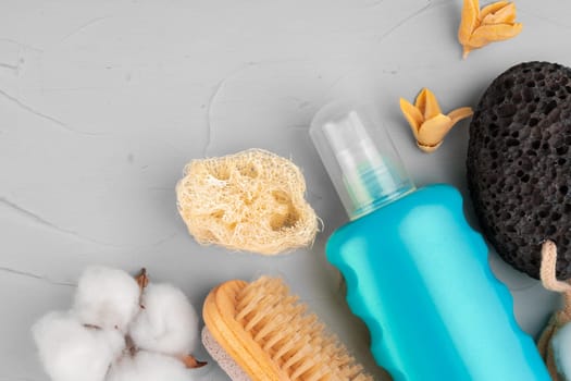 Plastic bottles of body care and beauty products composition close up