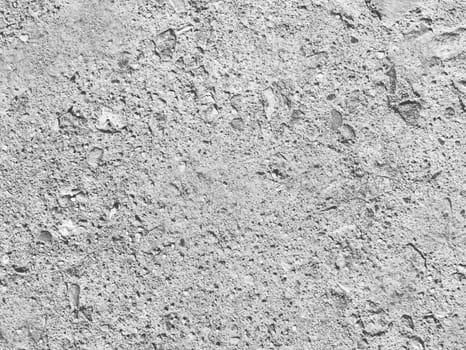 The texture of a gray concrete wall in close-up. Background for design with copy space.