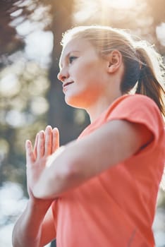 Woman, yoga and meditation with prayer pose, namaste and fitness outdoor with wellness, spiritual and low angle. Female person meditate, zen and exercise with healing, mindfulness and praying.