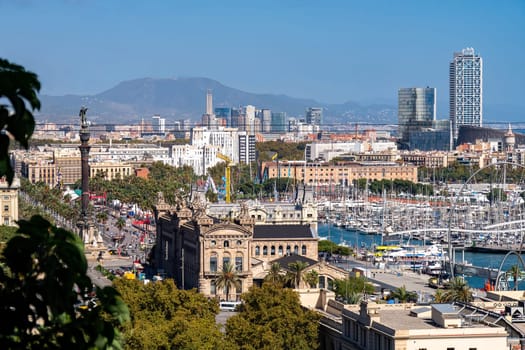 The View of Barcelona from Montjuic to the city, sea, streets, towers, The Columbus Monument, Port Vell, Bus station