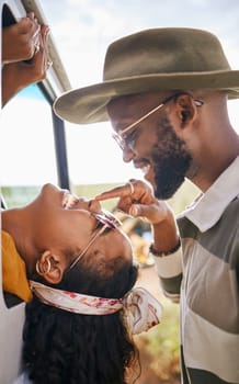 Love, happy and black couple nose touch for playful road trip bonding moment together in nature. Black woman and African man in romantic relationship enjoy travel adventure fun in South Africa