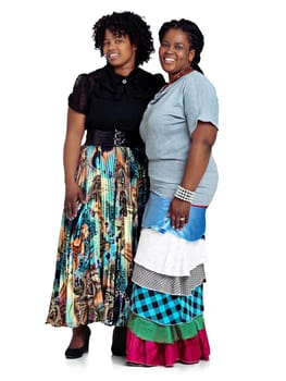 Sister power. Studio shot of two african women standing against a white background