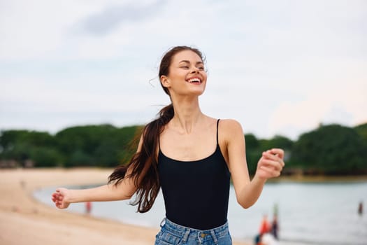 vacation woman running nature female summer happiness wave beach carefree sun sea body lifestyle young fun travel smile flight freedom sunset