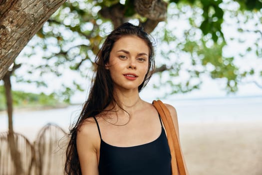 woman female running free holiday sea ocean summer sand leisure enjoyment carefree vacation person young happy smile sunlight peaceful beach nature