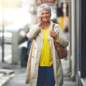 Phone call, city and portrait of senior woman on cellphone discussion, communication or chat to smartphone user. Urban travel, connectivity and elderly person talking, walking commute or consulting.