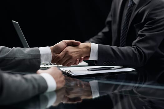 businessman shakes hands, making a deal with a lawyer. male judge legal
