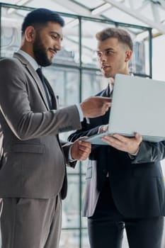 Businessman discussing project with colleague