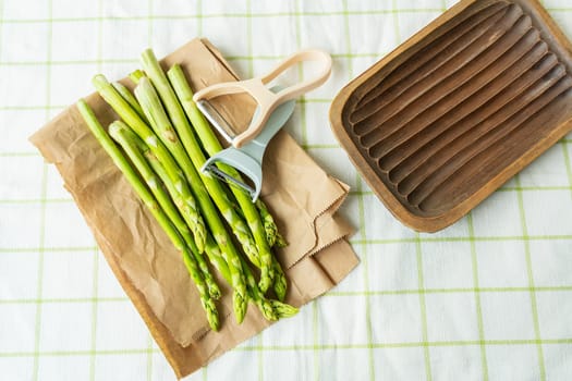 Cleaning process of green asparagus. Clean and wholesome food for health. Vegetarianism, raw food