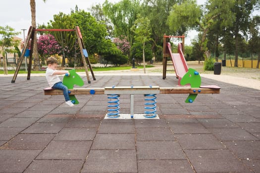 Child having fun on a swing.