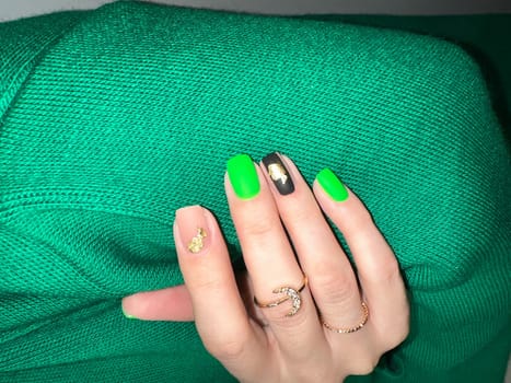 beautiful manicure of nails on the background of a fashionable texture