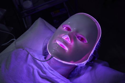 woman with led light therapy facial beauty mask photon therapy