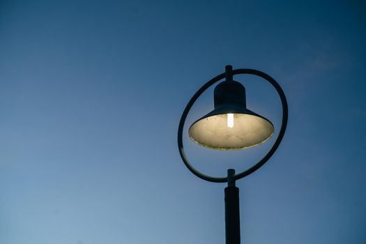 close up of street light and blue sky background