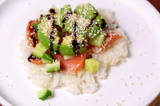 Sushi waffles are crispy rice cooked in a waffle iron with salmon. Trending food, hybrid food