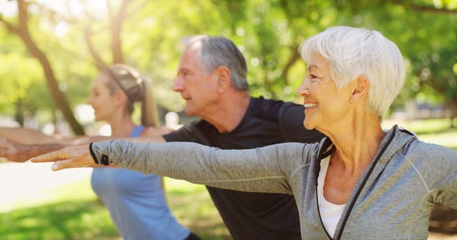 Yoga, fitness and an old couple with their personal trainer in a garden for a health or active lifestyle. Exercise, wellness or zen and senior people outdoor for training with their pilates coach.