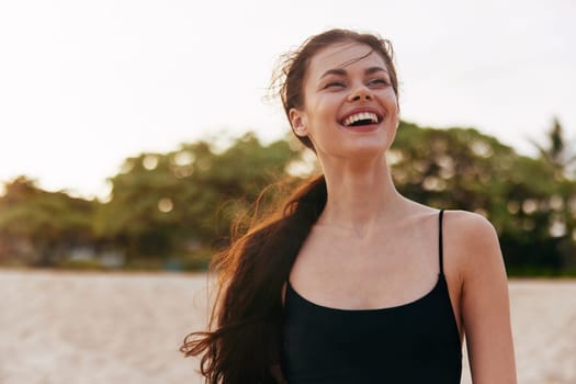 woman young vacation travel sand summer sunset walking sunlight outdoor holiday beach coast ocean nature sun beauty lifestyle smile sea freedom