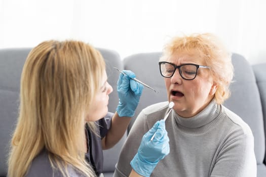 Female dentist and her patient