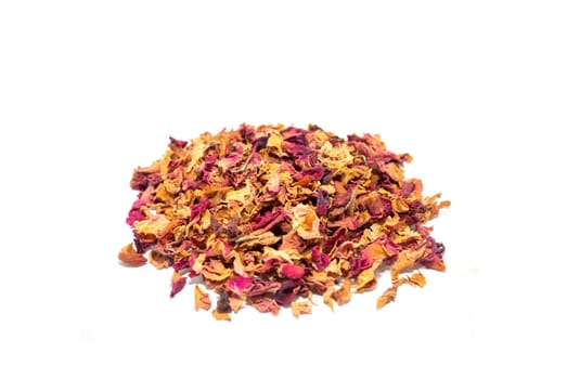 Isolated dried rose petals, leaves, buds on white background. Desiccated colorful flower petals for aromatic herbal tea, beverage. Horizontal plane, close up.
