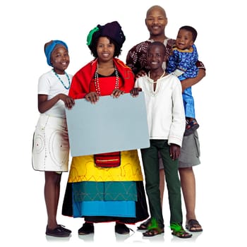 Family with a message. Studio shot of a traditional african family holding a blank board, isolated on white