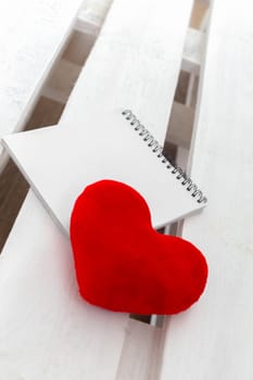 Red heart and notebook