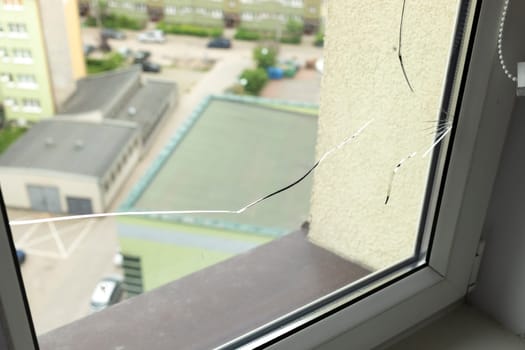 Crack, Broken Glass In A Double-glazed Window Due To Manufacturing Defect In Building, Home. Manufacturer's Defect, Defective Products. Warranty. Horizontal Plane. Closeup. High quality photo